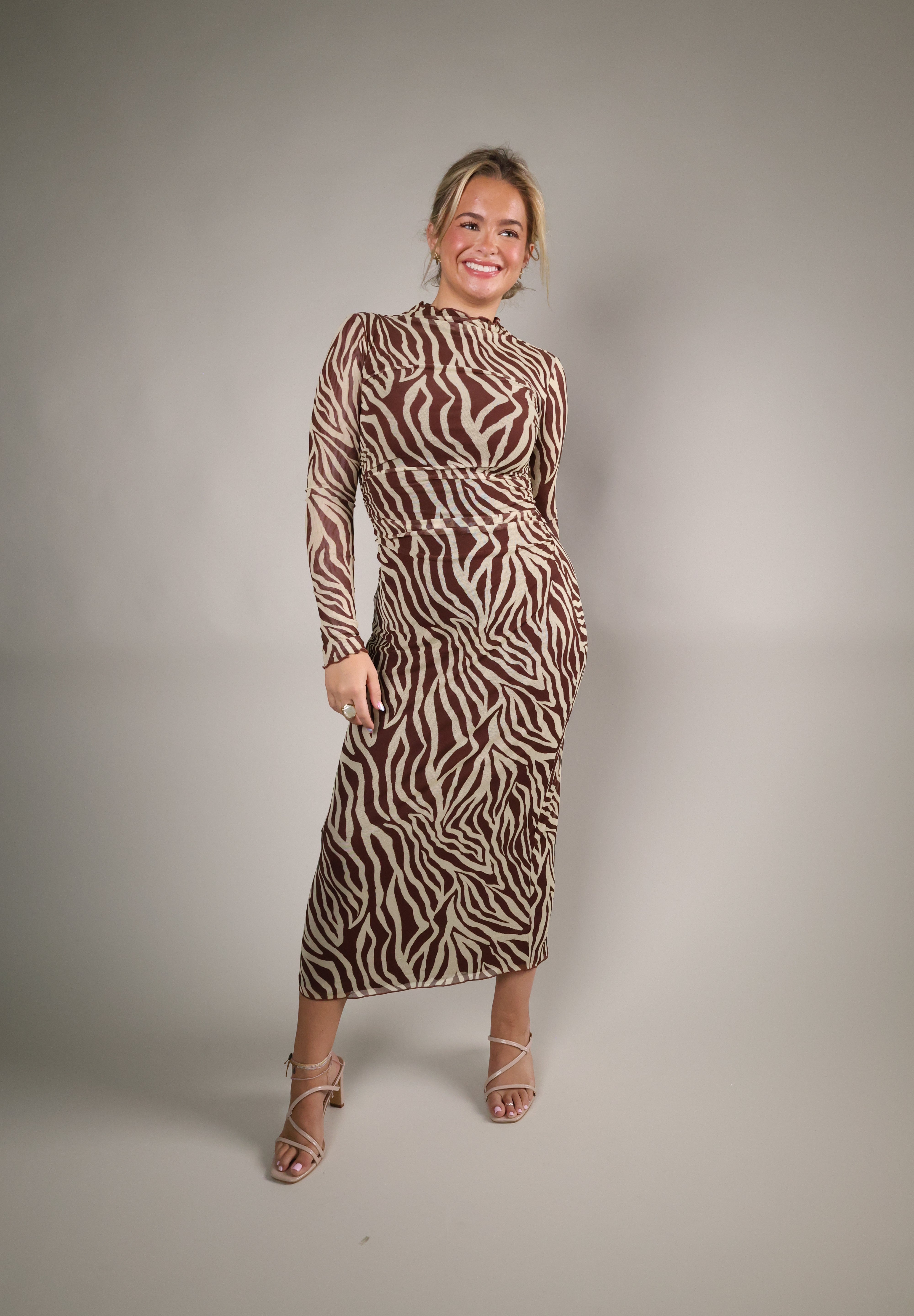 Women’s Velvet Rouge zebra print midi dress with lightweight mesh fabrication and long sleeves