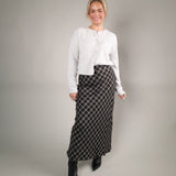 Shear Boutique Europa Plaid Skirt in ash black, a versatile women’s fall maxi skirt with a relaxed flowy fit.