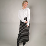 Flowy women’s plaid maxi skirt with elastic waist and soft lined fabric, perfect with sweaters and cardigans.