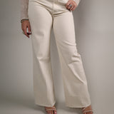 Women’s Wheat wide-leg jeans with high-rise fit, soft stretch denim, and raw hem