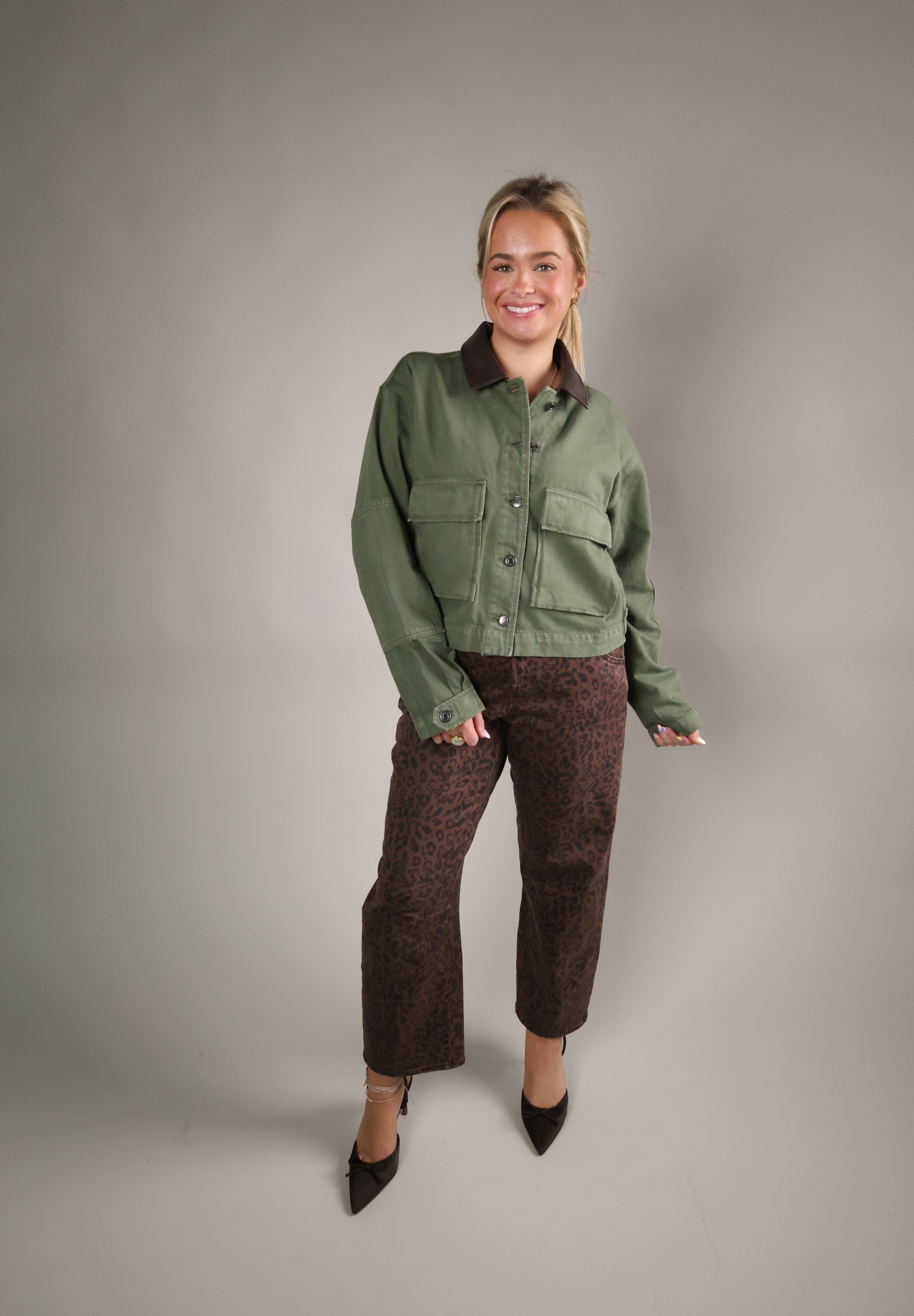 Cropped leopard print jeans for women in rich brown tones with a structured barrel-leg fit and comfortable stretch.