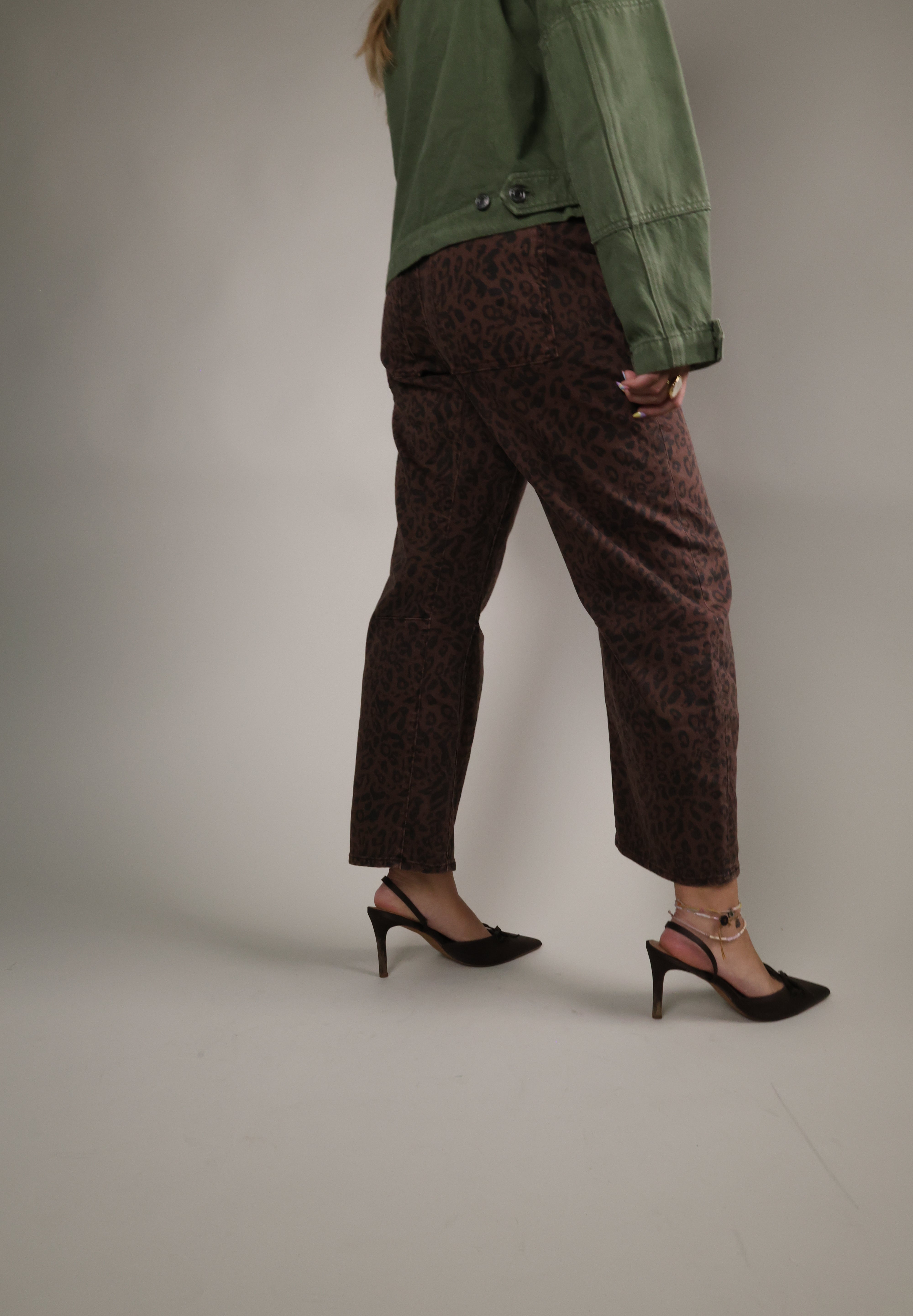 Shear Boutique Lasso Barrel Jeans featuring a trendy brown animal print and on-trend barrel-leg silhouette.